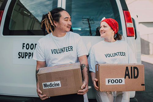 Volunteers Administering Aid to Those in Need